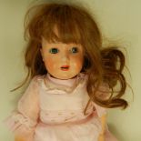 A bisque headed doll by C.M.