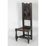 An early 18th century joined oak back stool the shaped top rail over a lozenge carved panel and