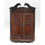 A George III oak wall hanging straight front corner cabinet,
