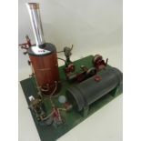 A large model steam plant of unknown manufacture on a base measuring 46cm x 68cm featuring a