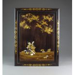 A Japanese inlaid lacquer hardwood panel, Meiji period, of rectangular form, inlaid with ivory,