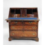 A George III oak crossbanded mahogany fall front bureau,