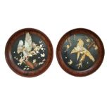 A pair of Japanese shibayama plaques, Meiji/Taisho period, of circular form,