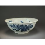 A Caughley wash stand bowl transfer-printed with the Pine Cone, Three Flowers and Fat Pear pattern,