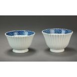 Two Caughley reeded tea bowls with internal cell diaper borders, circa 1778-85, one with C mark,