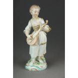 A Plymouth porcelain figure of a girl holding a banjo, circa 1770,