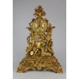 A late 19th century Louis XV style ormolu mantel clock, the 3.