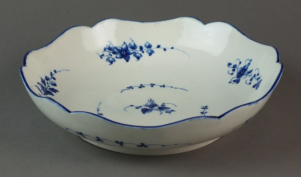 A Caughley salad bowl painted with the Bright Sprigs pattern, circa 1786-92, S mark, 23.