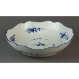 A Caughley salad bowl painted with the Bright Sprigs pattern, circa 1786-92, S mark, 23.