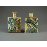 Two Persian pottery tea caddies, probably 19th Century, of rectangular form with cylindrical necks,