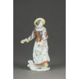 A Bow porcelain model of Columbine from the Commedia Dell'Arte series, circa 1760,