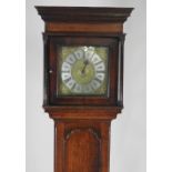 An 18th century oak thirty hour longcase clock, the 11 inch dial with ring of Roman numerals,