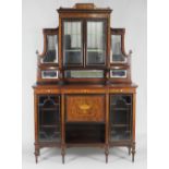 An early 20th century mahogany marquetry and ivorine strung breakfront side cabinet by Edwards and