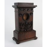 A 19th century mahogany empire style pocket watch tower, with hinged lid, 1.