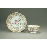 A Chinese famille rose teabowl and saucer, Qianlong, of plain rounded form,