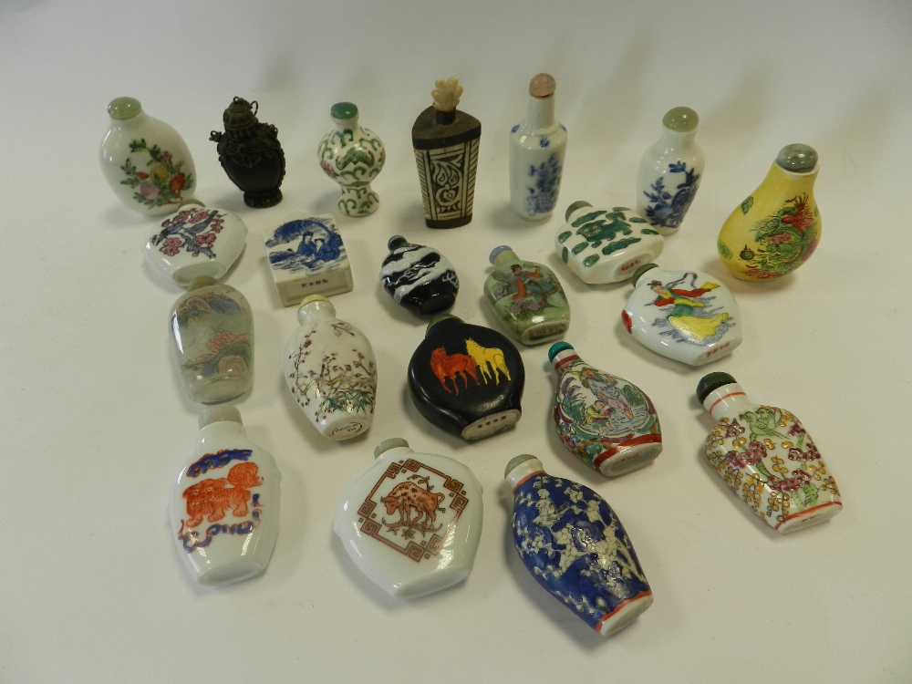 A lot containing 21 reproduction Chinese snuff bottles including inside painted examples,