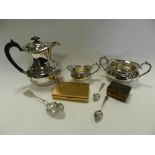 A tray to include an EP four piece tea and coffee service, George III bright cut silver tea spoons,