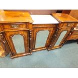 An Edwardian figured walnut and marquetry drop-centre chiffonier