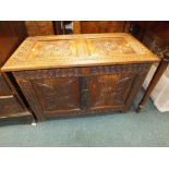 A 20th century two panel coffer in the Charles II style