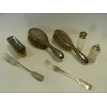 Three silver backed brushes,