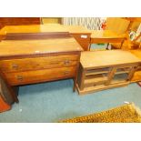 An early 20th century oak chest of two drawers, a draw leaf table, a modern low hi fi cabinet,