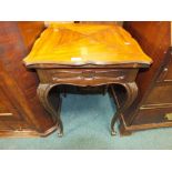 A Louis XV style envelope card table with single frieze drawer