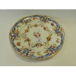 A 'Sevres' cabinet plate painted with floral festoons within blue foliate and gilt toothed borders,
