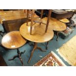 A group of assorted pedestal occasional and wine tables along with an octagonal oak low occasional