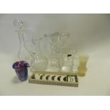 Three trays of decorative cut glass wares including vases, bowls, decanters, jugs, etc.