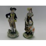 A pair of Derby polychrome figures of a Shepherd and Shepherdess,