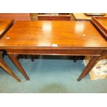 A modern reproduction mahogany veneered fold over card table,