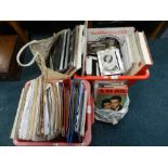 Two boxes and bags of film memorabilia including black and white publicity cards,