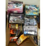 A box of boxed Space 1999 and other science fiction series models including UFO Shado Interceptor,