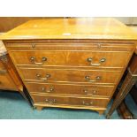 A modern 18th century style chest of four long drawers under a brushing slide raised on bracket