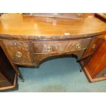 A 19th century mahogany bowfront sideboard fitted with brass ring handles