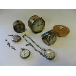A silver open face pocket watch together with a further silver open face pocket watch,