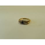 An 18ct gold sapphire and diamond ring