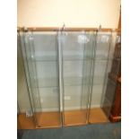 Four modern floor standing square section collectors'/retailers' display cabinets