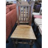 A set of six modern pine lath back kitchen chairs