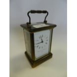 A brass cased carriage clock by Matthew Norman of London