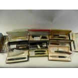 A collection of various pens to include Sheaffer examples and Parker examples,
