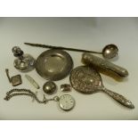 A silver pill box, the top with a teddy bear finial together with a silver backed hand mirror,
