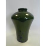A high fired green and mottled blue high shouldered stone ware Art Pottery vase