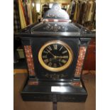 A Victorian black slate mantle clock with coloured stone detailing, gilt Roman numerals,