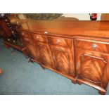 A modern mahogany finished three height book case, 65cm wide,