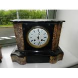 A French black and pink veined marble mantel clock,