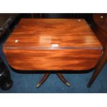 A 19th century mahogany Pembroke table with single end drawer on four down curved and inlaid legs,