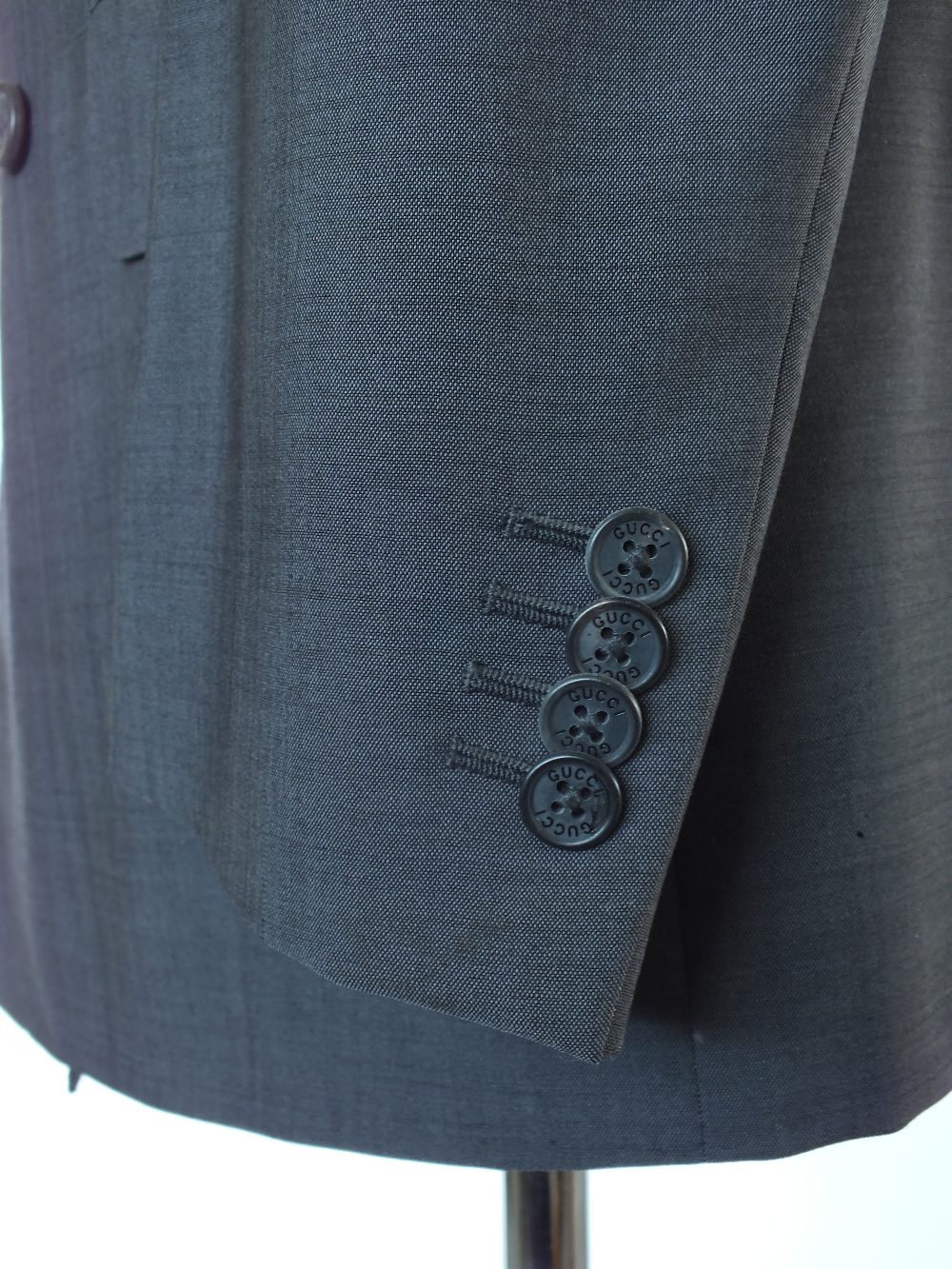 A Gucci suit, grey, double vent, Italian size 50R, 75% wool, 25% mohair, damage to left shoulder, - Image 6 of 9