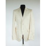 A Gucci dinner jacket, cream, self patterned fabric, double vented, plain satin lapel, lined, a