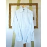 A Gucci shirt, pale blue with small horse bit woven pattern to fabric, two button cuff, 16.